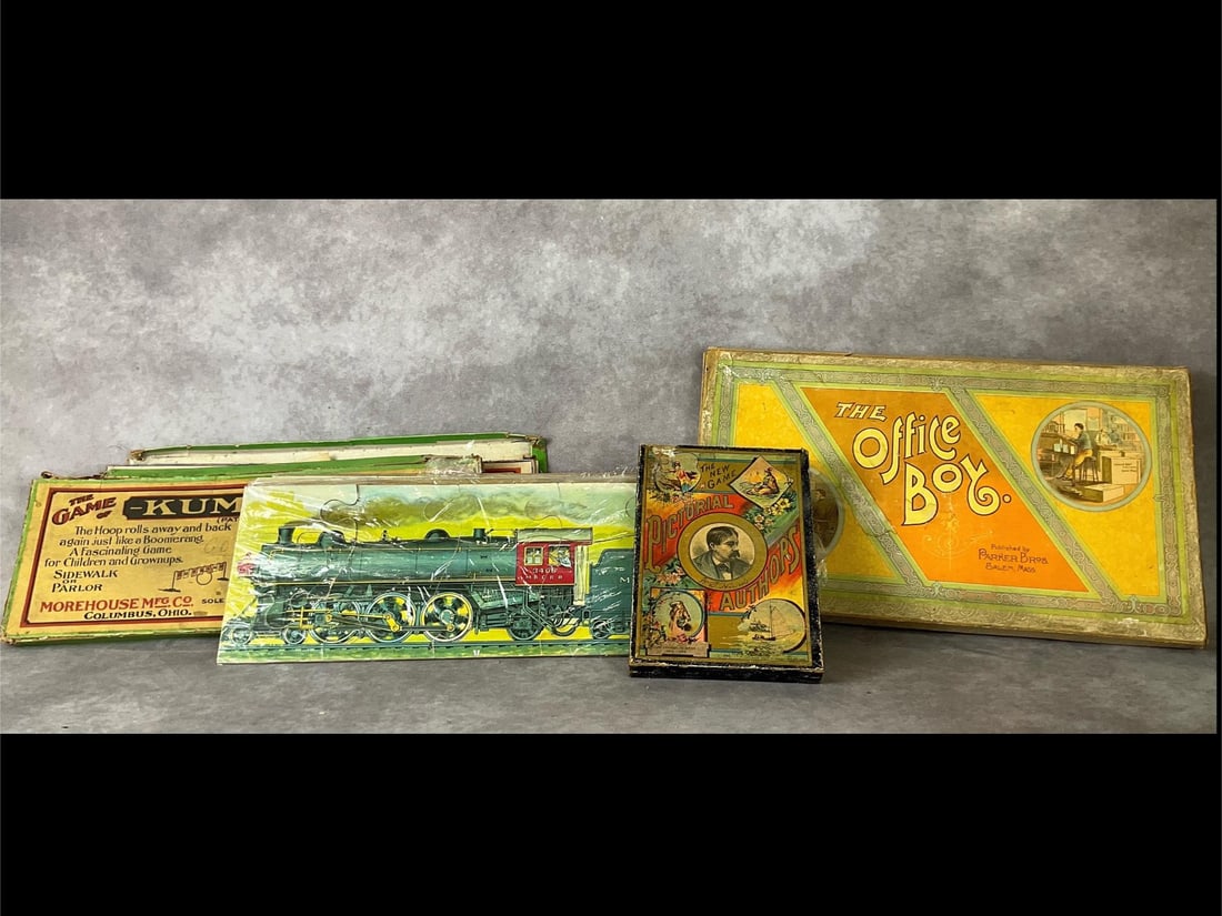 Lithographed Games & More: 1890s to 1900s. Includes train puzzle, Pictorial Authors game, two Kum Back games, The Office Boy. Kum Back and The Office Boys are published by the Parker Brothers. Boxes have paint loss, creasing, a