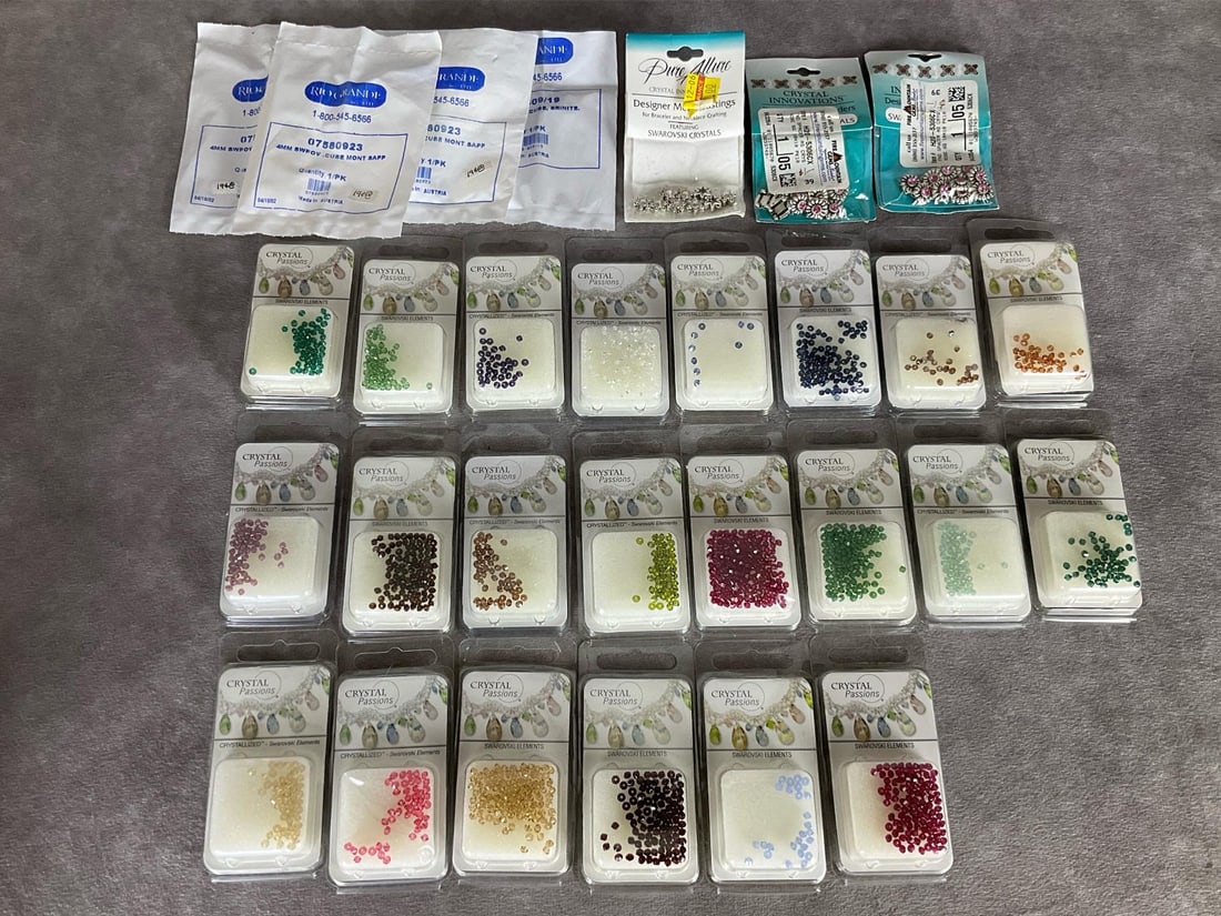 Swarovski Crystal Elements: Crystallized Swarovski Elements, Crystal Innovations, Swarovski Cube. Not all are full packs. Good condition.