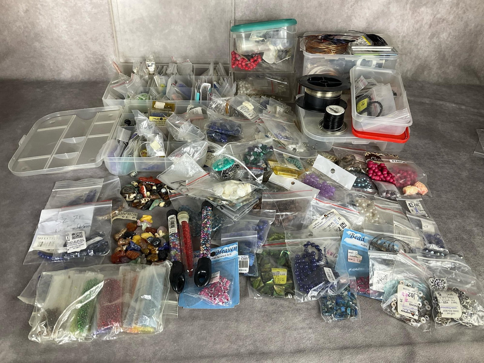 Jewelry Making Supplies: Seed beads, wire, carved stone animal beads, findings, colorful freshwater pearl beads, Czech crystal beads, organizers, and much more. Overall good condition.
