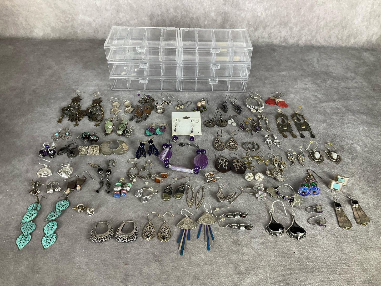 Pierced Earrings: Many marked .925. All are matched but not all have backs. One pair has a matching bracelet. Fish hook, posts, lever back, etc. Good condition. Includes six plastic organizers.