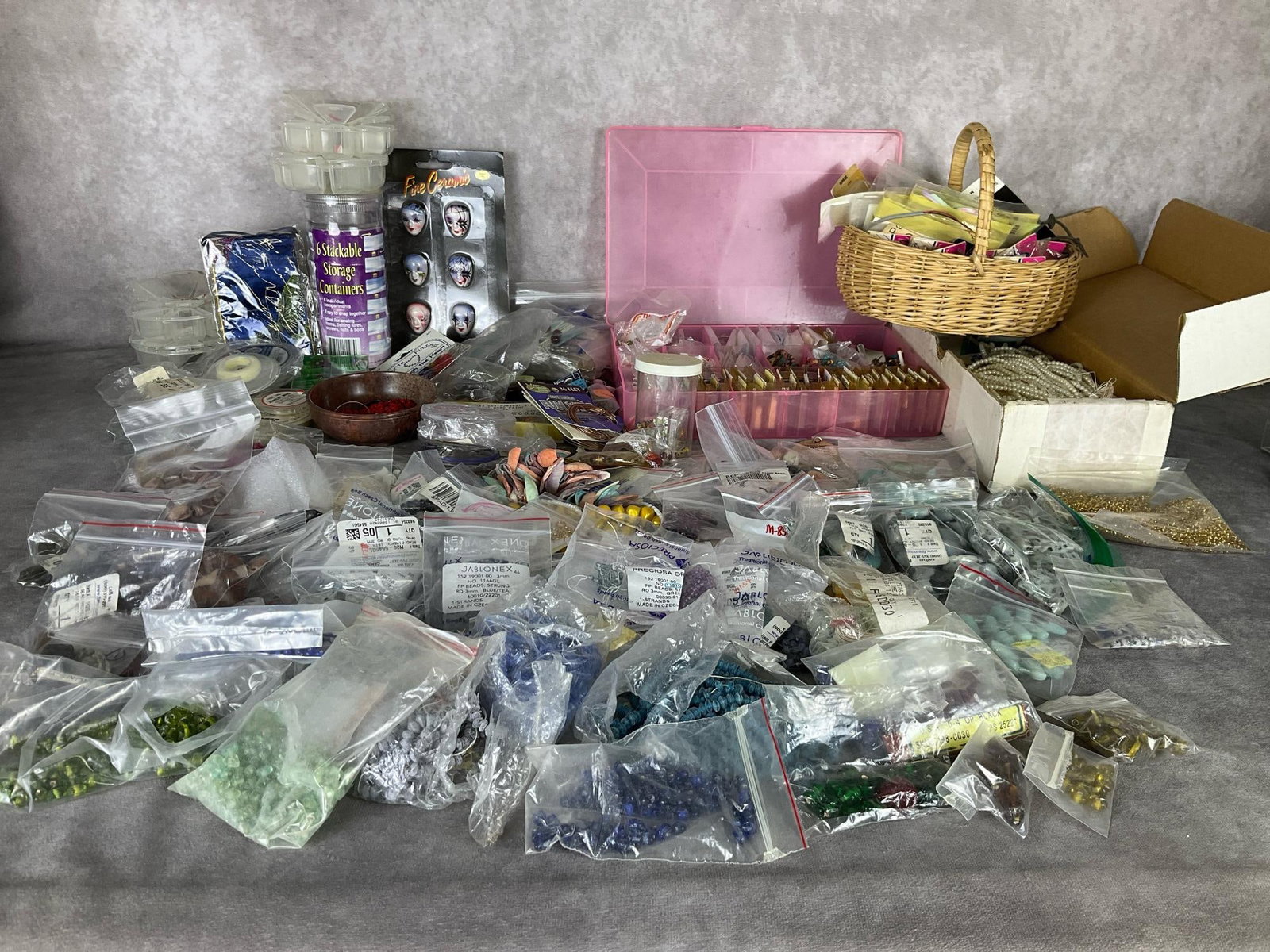 Jewelry Making Beads & Supplies: Czech crystal beads, rock and gemstone beads, seed beads, plastic sorting containers, ribbon, faux pearls, and much more. Overall good condition.