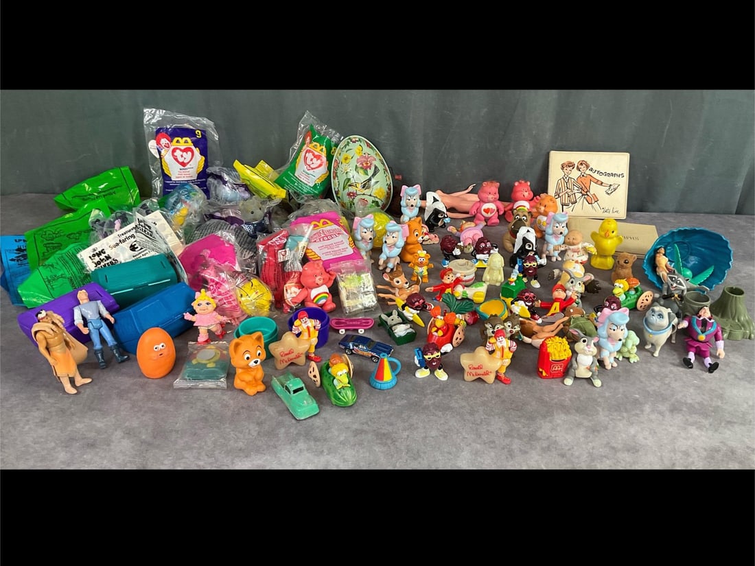 McDonald's Happy Meal and Burger King Toys and More: Large lot including Power Rangers, Ty, Barbie, Long John Silvers, Care Bears, California Raisins, Bambi, Strawberry Shortcake, Sesame Street, Disney, Pokeman and more. Some are in original packaging. 