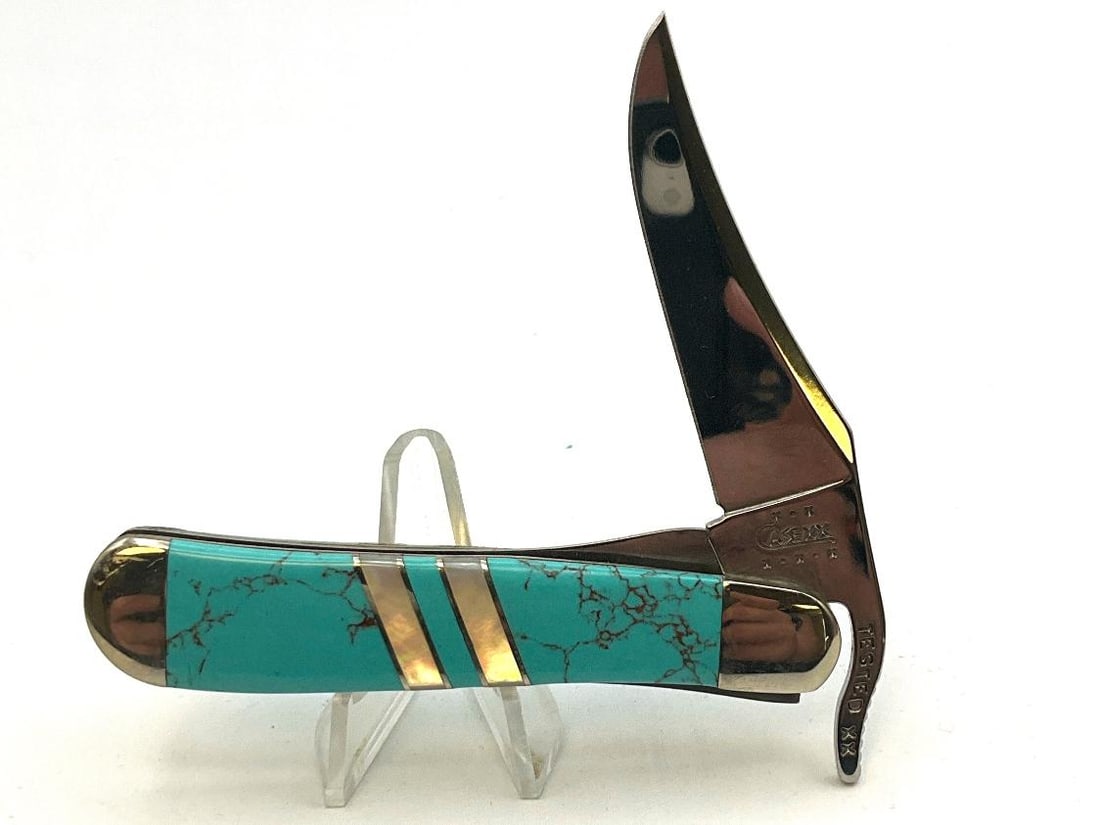 CASE XX Russlock Knife: EX1953L SS. Turquoise and Mother of Pearl. Has not been sharpened or carried. Snap is tight. Includes velvet clamshell case and sleeve, along with all paperwork. 4.25 inches closed.