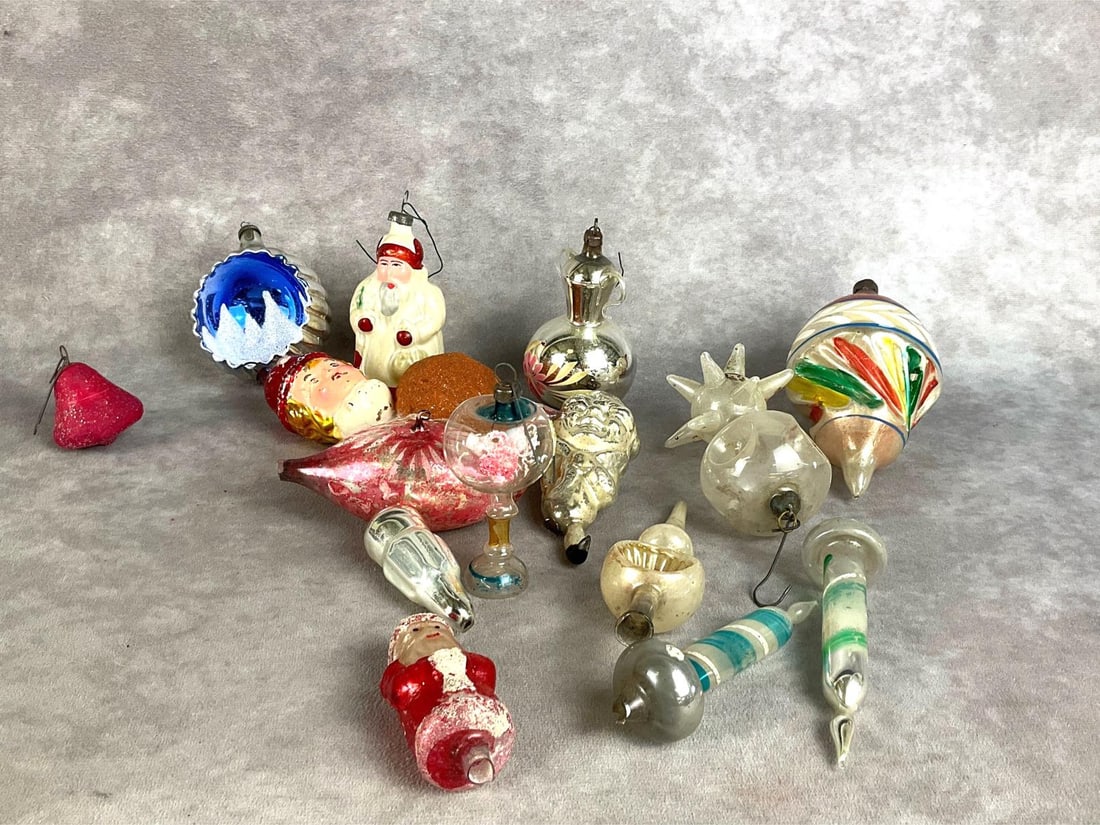 Hand Blown Ornaments: Sixteen total. Most are hand painted. Silver tea pot, German Santa and faces, candles, a topper, a bird with missing tail feathers and more. All have paint loss, and some are missing tips, otherwise g