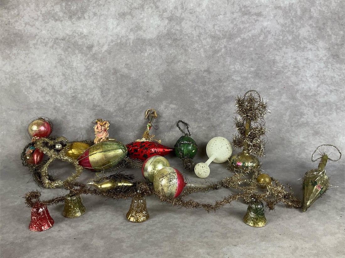 German Tinsel Wire Mercury Glass Ornaments: Fifteen ornaments and one garland. Vase, umbrella, bulbs, bells, birds, and hot air balloons. Many ornaments are missing wires and tinsel, and all have paint loss. Poor to fair condition. Umbrella mea