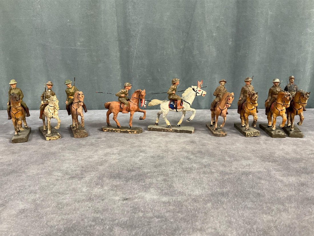 1930's Elastolin Soldiers on Horseback: Nine in total. British and one French Foreign Legion. Two with flags, some have been repainted, cracking, paint loss, and one missing a hand. 3.5 inches tall.