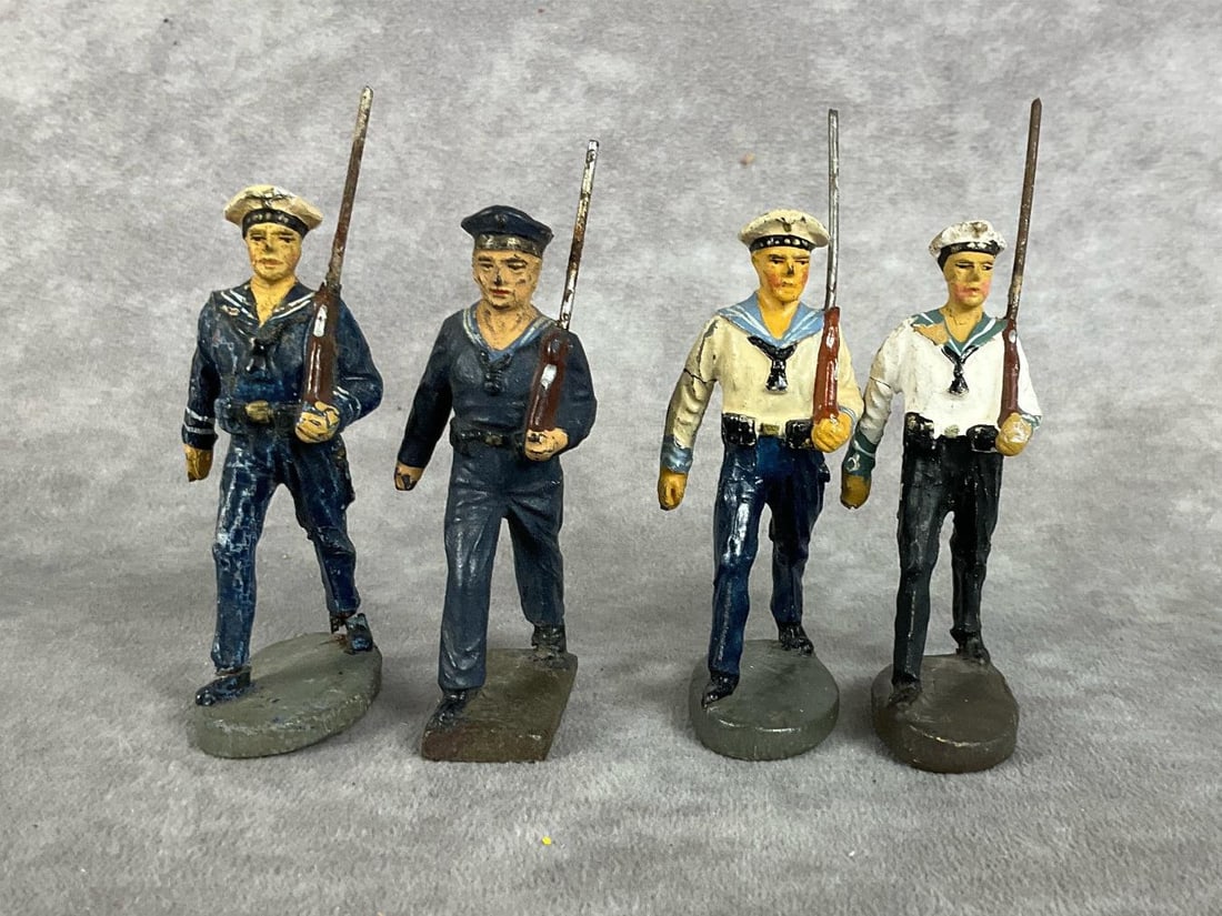 Elastolin & Lineol German Navy Soldiers: German Navy and Marine. Four are marked Elastolin and one is marked Lineol. Cracking and paint loss. Several have been repainted. Tallest is 3.5 foot inches.