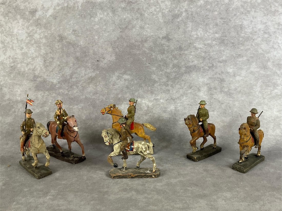 Elastolin Soldiers & Horses: 1930s six horses and six soldiers. Horses marked Lineol, Elastolin, and unmarked. Cracking, paint loss, repainted, missing limbs. Horses are 3.5 inches long.