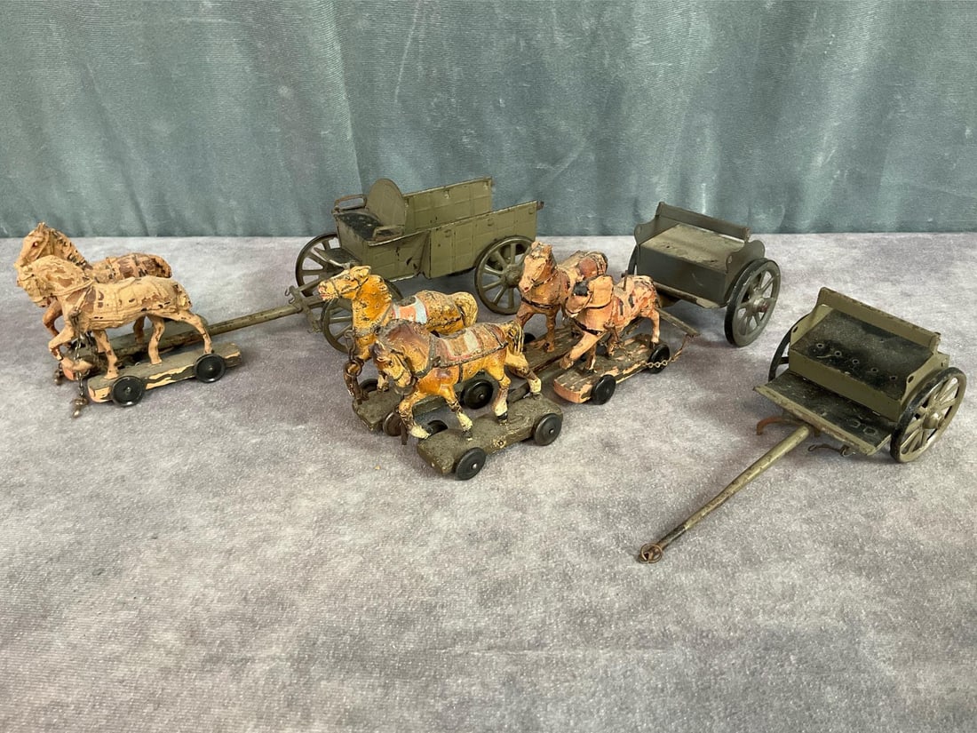 Lineol Elastolin Horse Drawn Wagon & Caison: 1930s made in Germany wagon and horses, two unmarked. Two horses marked Lineol, other four unmarked. Rust on metal, cracking, paint loss on horses. Wagon measures 9 inches long x 2.5 inches wide.