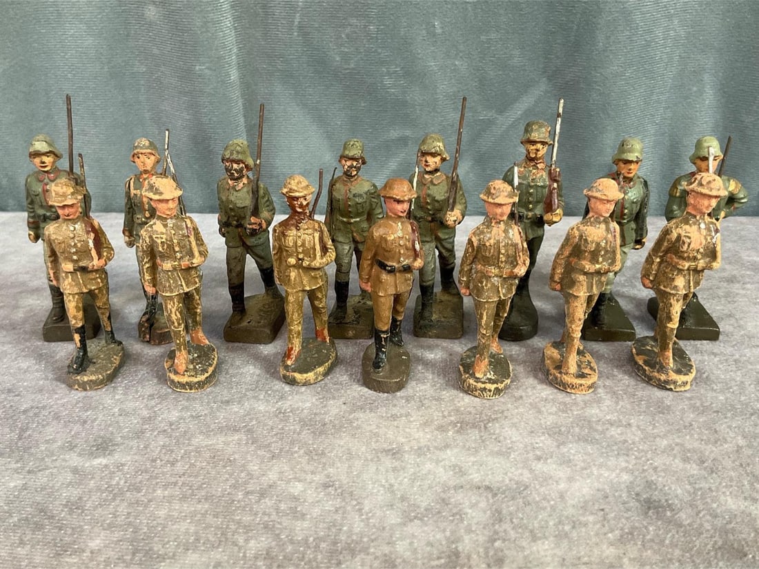 Elastolin Soldiers: Fifteen 1930s German and American soldiers marked Lineol and Elastolin. Cracking, paint loss, repainted, 3 inches tall.