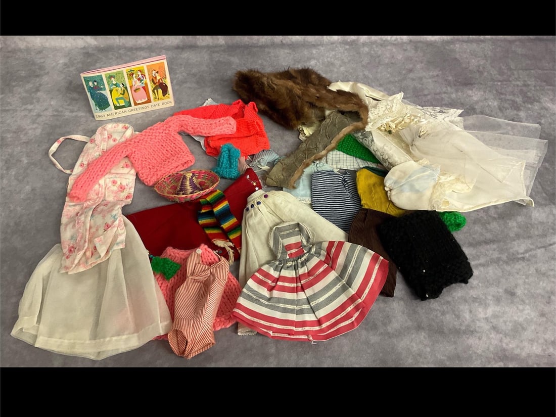 Barbie Clothes and Pulaski Memorabilia: Over 25 + items. Most are handmade. Includes bathing suit, wedding dress, fur pieces, knitted items and more. Most are in fair condition. 1963 American Greetings Date Book from Pulaski Walgreen Agency
