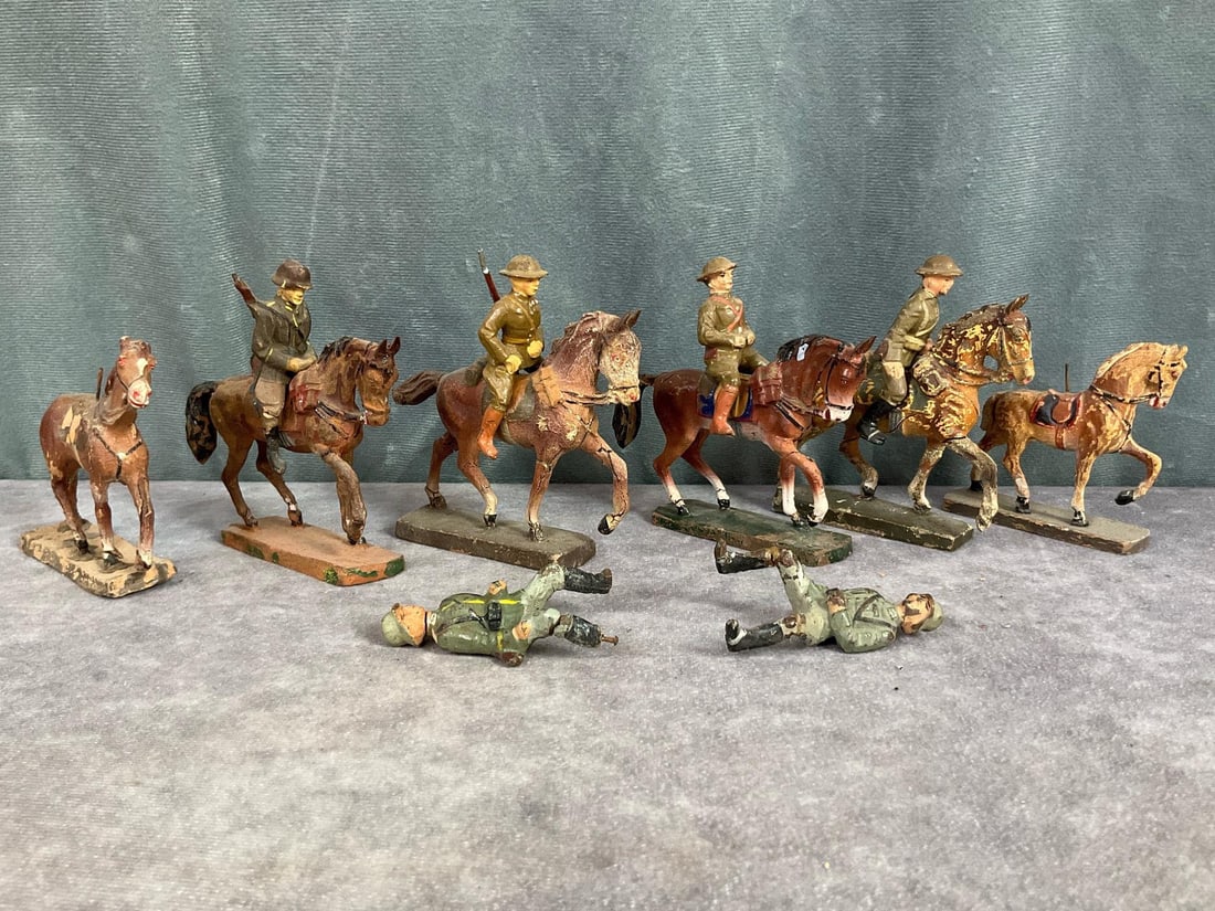 Elastolin Soldiers on Horseback: 1930s, six horses and six soldiers. Horses marked Elastolin, Lineol, and unmarked. Cracking, paint loss, and repainted. Horses measure 3 inches tall.