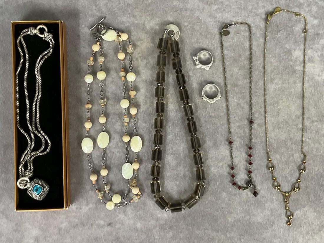 Designer Sterling Necklaces & Rings: Silpada polished stone beaded necklace marked .925. Saki Smokey gray glass beaded necklace marked .925, 8.25 inches long. Silver tone necklace with blue topaz like gem pendant, pendant marked .9.25. A