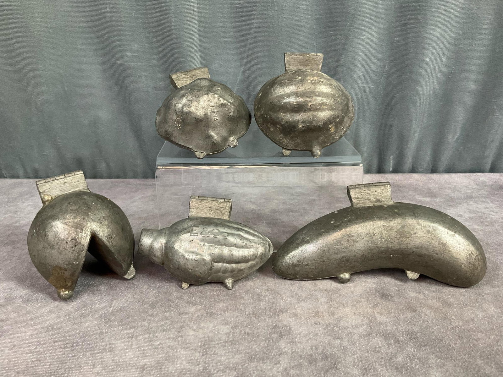 E&Co Ice Cream Moulds: Turn of the century pewter moulds marked NY and with mold number. Corn, banana, fortune cookie, and more. Lots of detail on the inside. Good condition. Banana measures 5.75 inches long x 3 inches wide