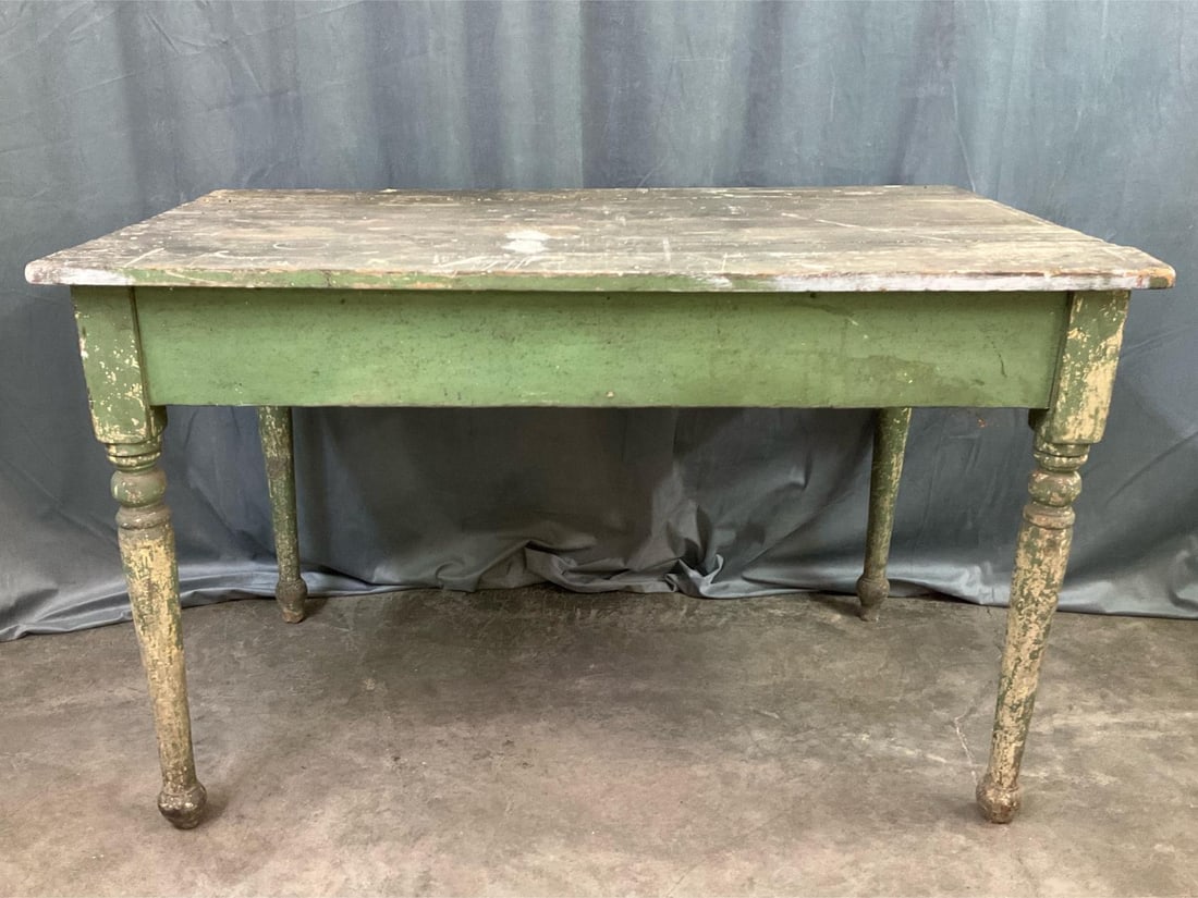 Old Farmhouse Table: Original green paint. Damage to top. Measures 48 inches wide x 30 x 30 inches tall.