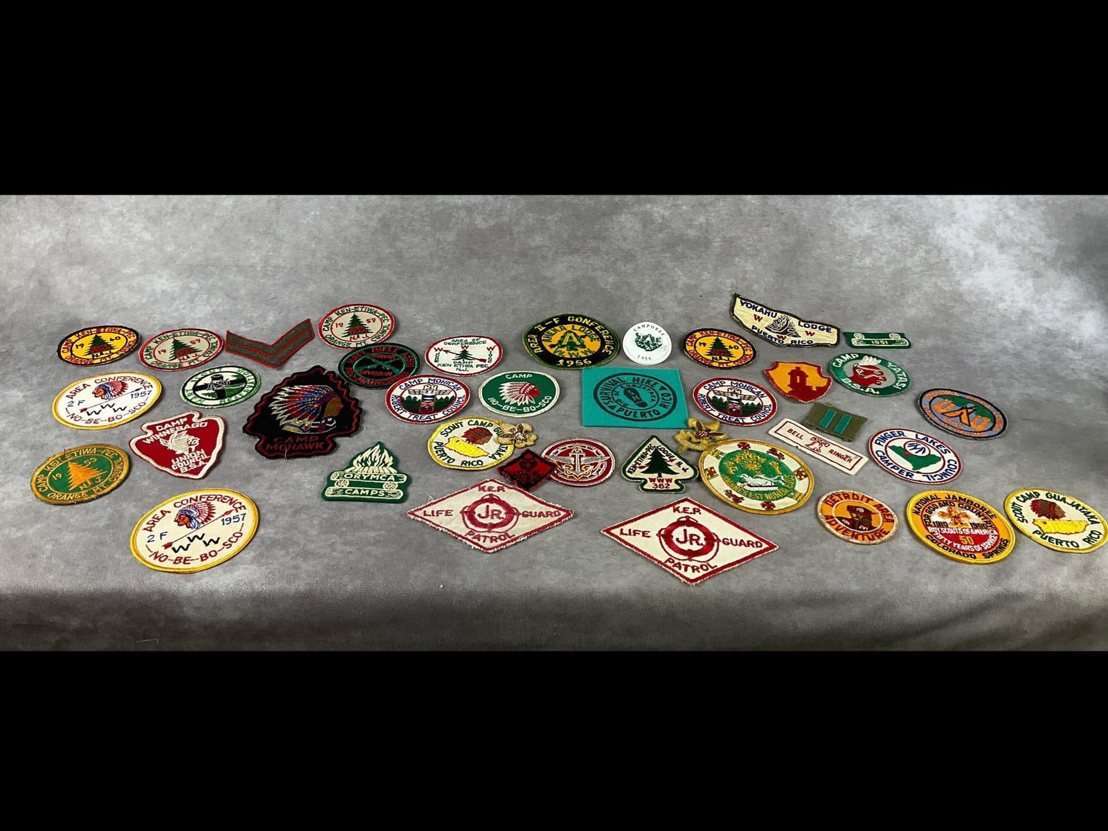 Boy Scouts & Order of the Arrow Patches: Over thirty Boy Scouts of America and Order of the Arrow patches. Most are camps and jamboree. Dates range from 1951 through the 1960s. Some patches have fraying, thread loss, and fading. Many appear 
