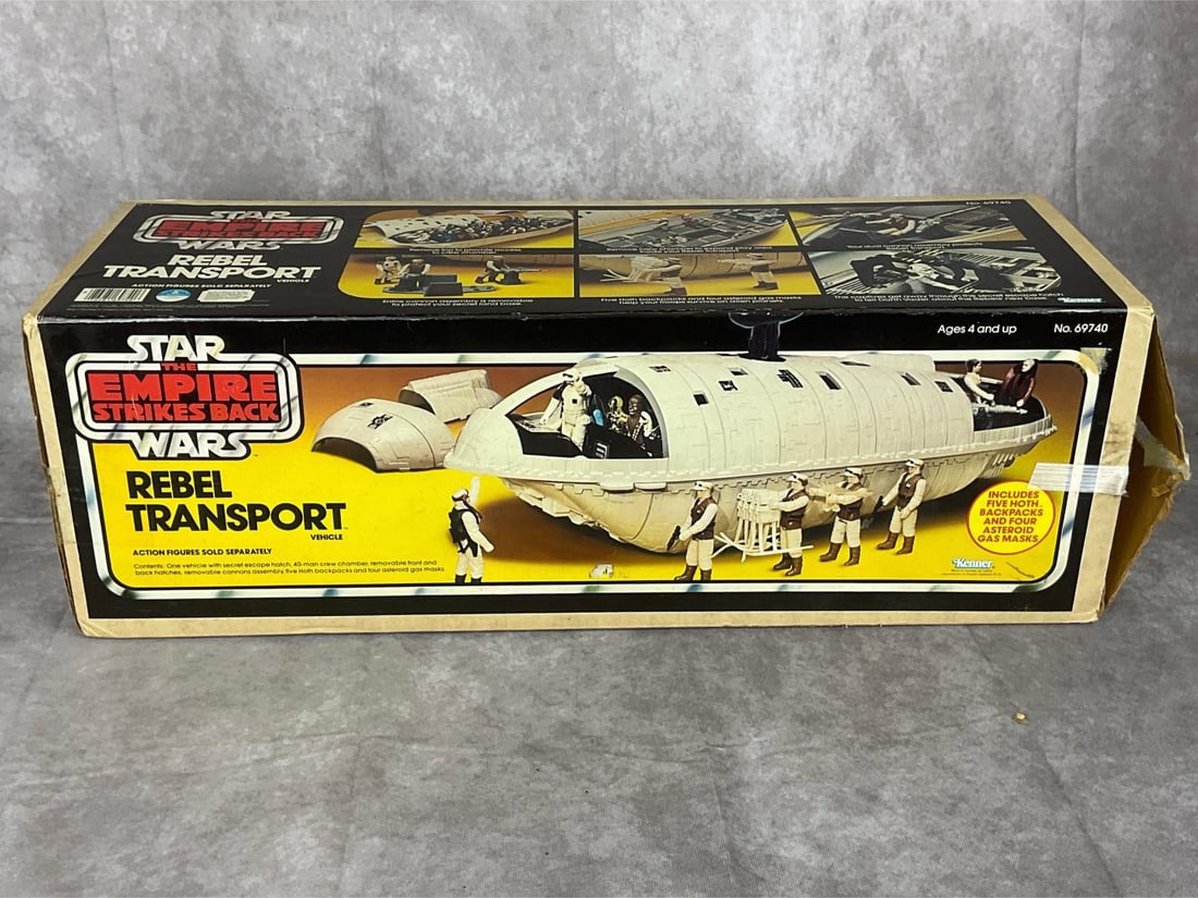 Star Wars - Empire Strikes Back Rebel Transport Vehicle: 1982, No. 69740, made by Kenner. Original pieces, missing all Hoth backpacks and asteroid gas masks. The latch is broken off the rod that holds the ship together. Otherwise in fair condition. The box 