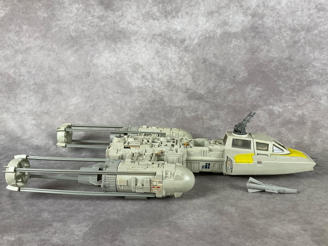 Star Wars Return of the Jedi Y-Wing Fighter: 1983, made by Kenner Toys. No. 70510. In good condition, with play wear. Some labels have fallen off. No box. Measures 20 inches long x 9 inches wide x 3 inches tall.