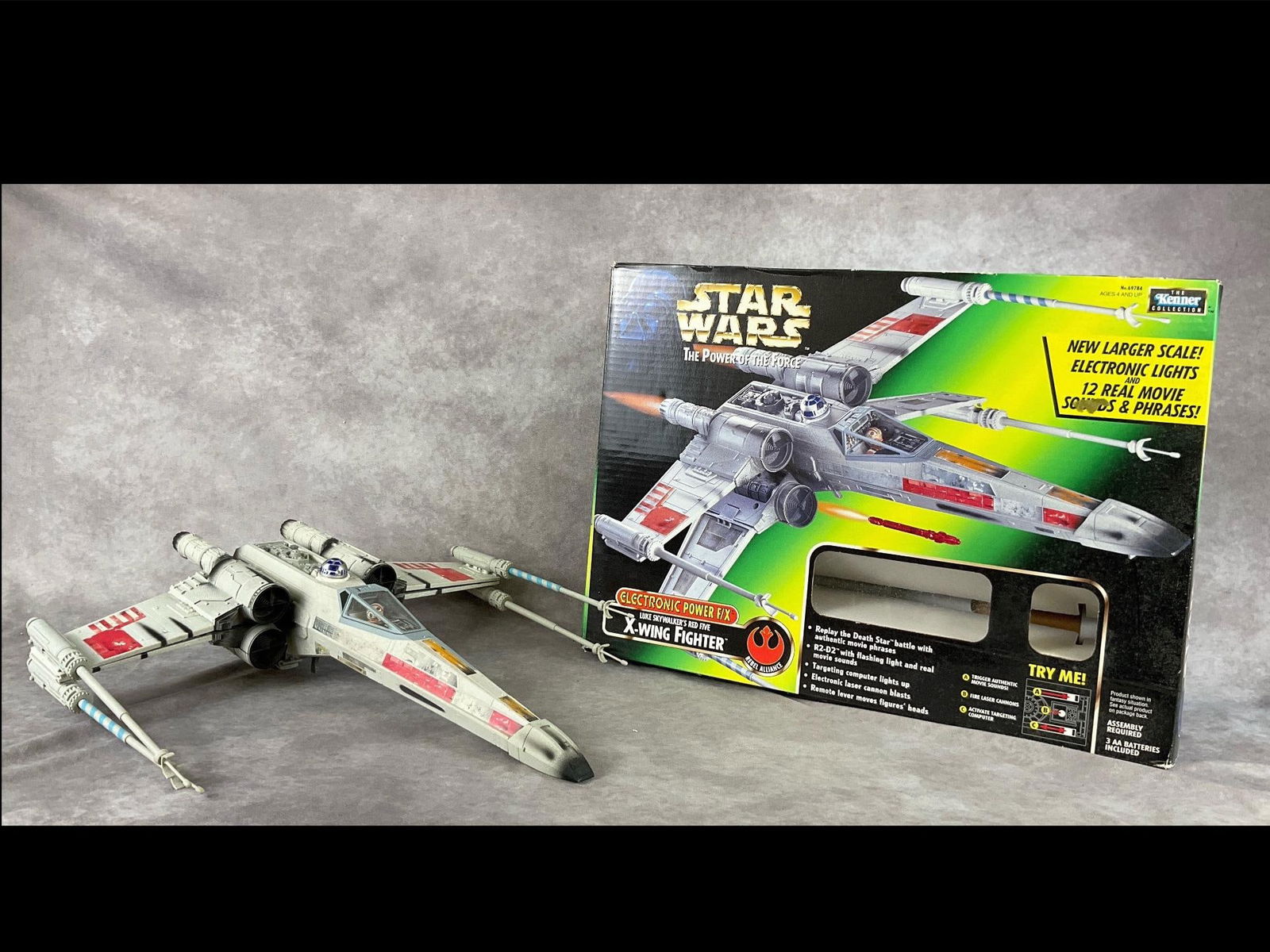 Star Wars X-Wing Fighter: 1997, No. 69784, made by Kenner Toys. Appears complete, with original box. Tested and working. Instruction booklet is missing. Box is in good condition with creases. Box measures 21 inches long x 5 in