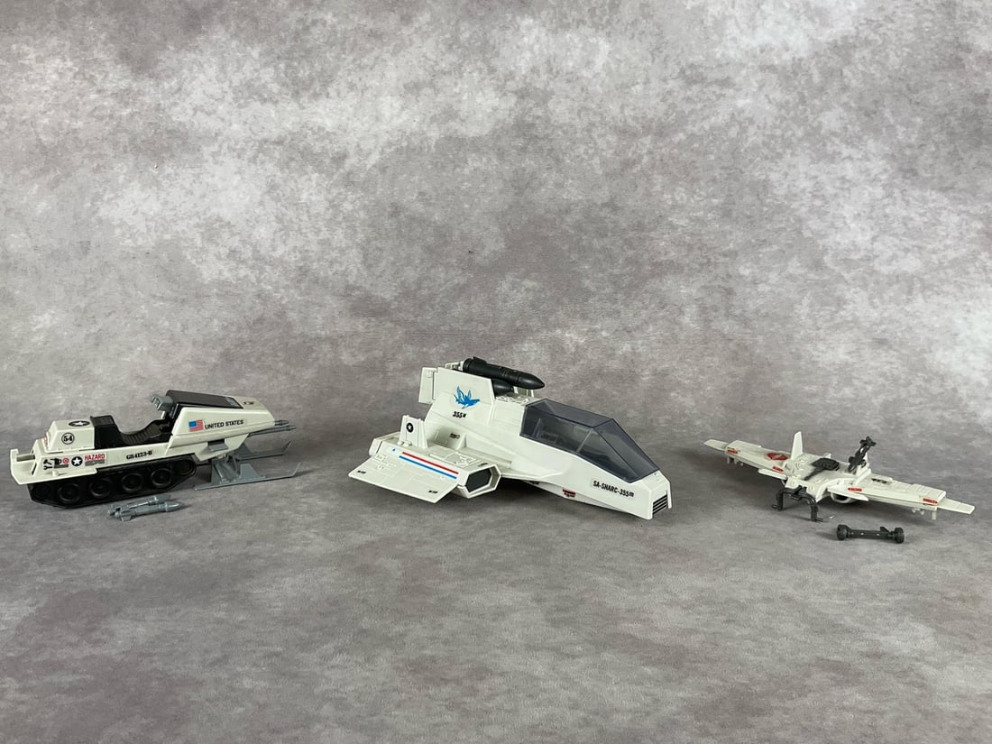 G.I. Joe Submarine, Snowmobile & Cobra Claw: All are made by Hasbro. 1984 S.H.A.R.C Flying Submarine with missiles, 1983 Cobra Claw, incomplete with broken landing gear, and a 1983 Polar Battle a bear Snowmobile, missing the roll bar and tape re