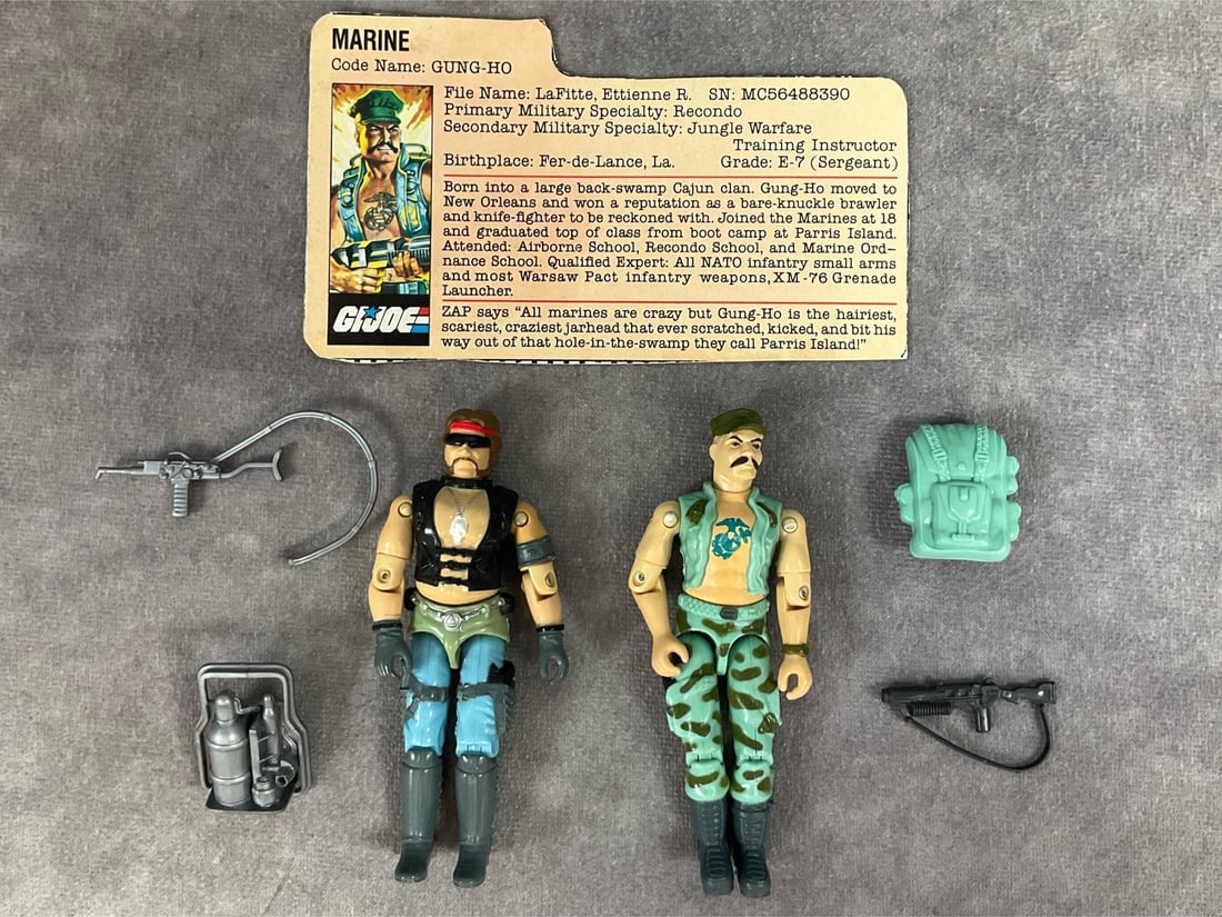 1983 Gung Ho & 1984 Torch: Lot of two G.I. Joe figures. One is a 1983 Marine code name Gung Ho. Swivel arm version, complete with original accessories and file card. Loose legs and torso. The other is a 1984 Torch. Swivel arm v