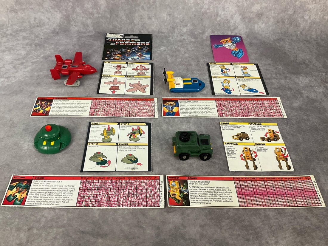 1980's Autobot Transformers: Lot of four mini Transformers made in Japan. Powerglide marked Hasbro 1984, Seaspray marked Takara 1984, Brawn marked Takara 1974, 1983, and Cosmos marked Takara 1984. All are in good condition and in