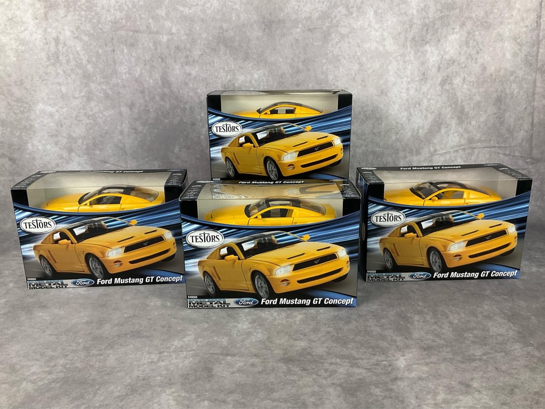 Ford Mustang Model Kits: Lot of four unopened 2010 model kits made by Testors. All four are the same model car. Good condition but one box has damage on top corner. Each one measures 9 inches long x 4 x 6 inches tall.