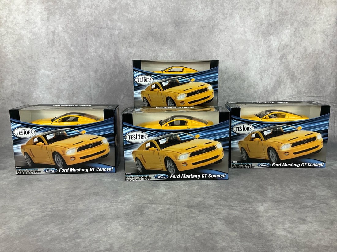 Ford Mustang Model Kits: Lot of four unopened 2010 model kits made by Testors. All four are the same model car. Good condition but one box has damage on top corner. Each one measures 9 inches long x 4 x 6 inches tall.