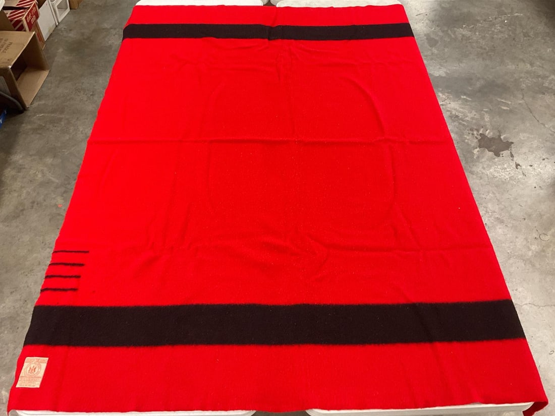 Hudson's Bay Point Blanket: 1950s red and black four point blanket, made in England. Good condition but does have pilling. Original label is attached. Measures 6 feet wide by 91 inches long.