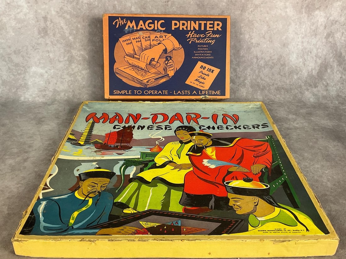 1940's Board Games: Lot contains a 1944 copy of The Magic Printer by the Mylan-Wright Company that appears complete and in fair condition but is out of Magic Spirit Fluid, and a 1940s Man-Dar-In Chinese Checkers Set that