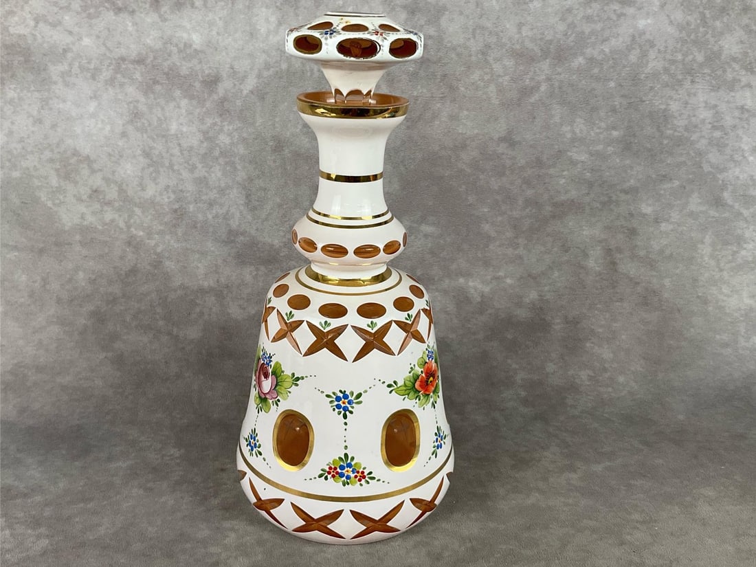 Bohemian Cut to Pink Decanter: Hand-painted poppy and rose floral patterns with gold accent. Cut glass, in good condition. Measures 6 inches wide at base x 12 inches tall.