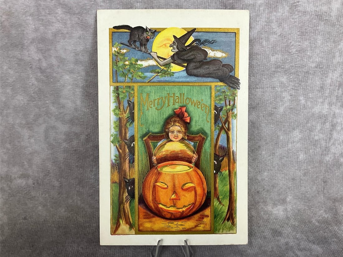Whitney Made Halloween Postcard: Circa 1910, unmarked Whitney made Halloween postcard. Card is embossed. Written on with pen on back. Measures 3.75 inches wide x 6.75 in soft plastic sleeve