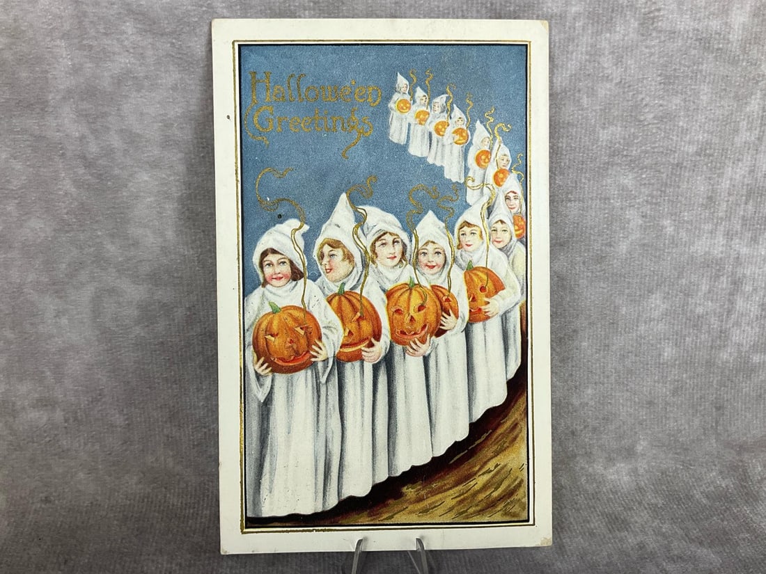 Whitney Made Halloween Postcard: Early 1900s post marked Halloween postcard. Marked Whitney Made Worcester Mass on back. Card is embossed with gold painted accents. Good condition, but does have soft corners. Measures 3.75 inches wid
