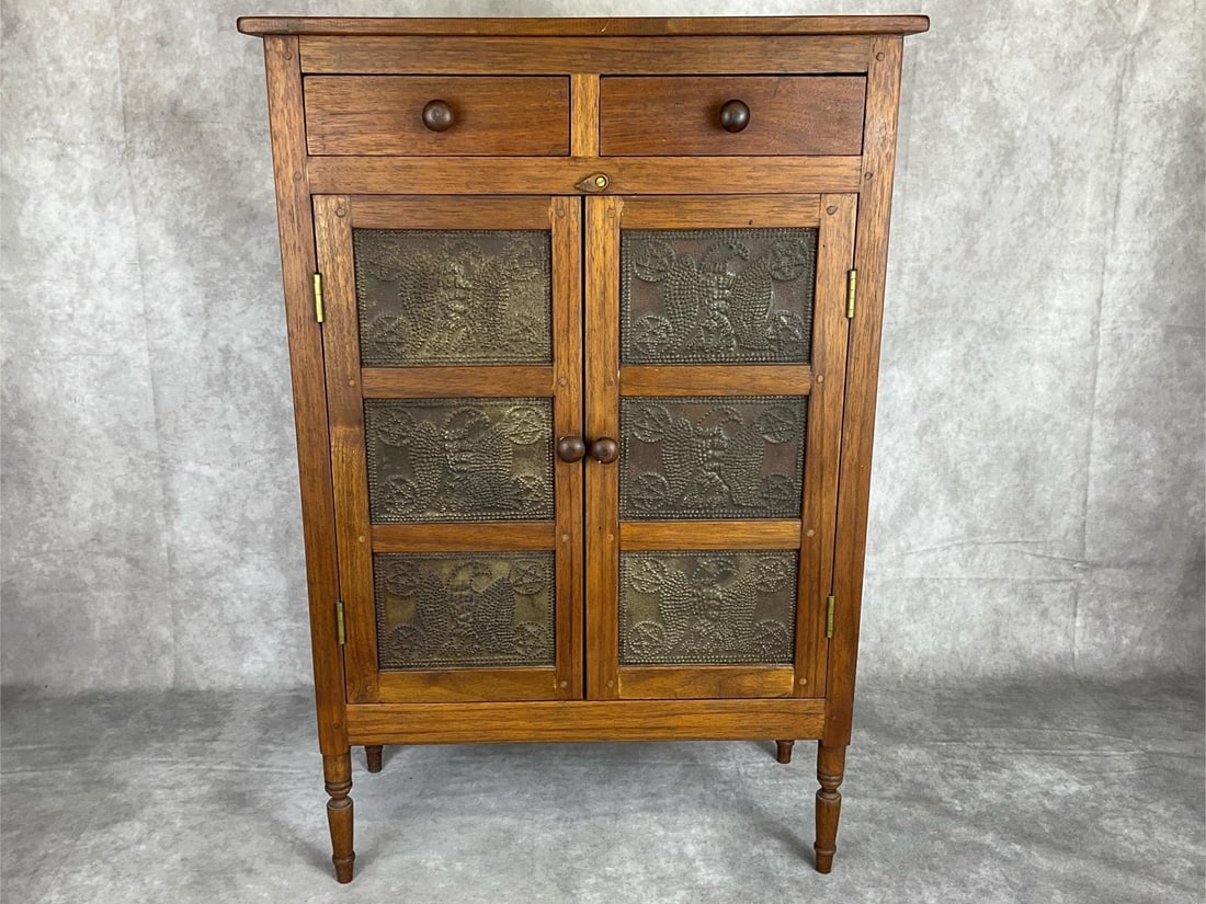 Miniature Folk Art Childs Pie Safe: Local artist William Morgan from Botetourt, VA. Replica of an 1860s to 1880s, built in 1999-2009, punched tin pie safe. Made from walnut with punched metal tins in an eagle and star design, turned leg