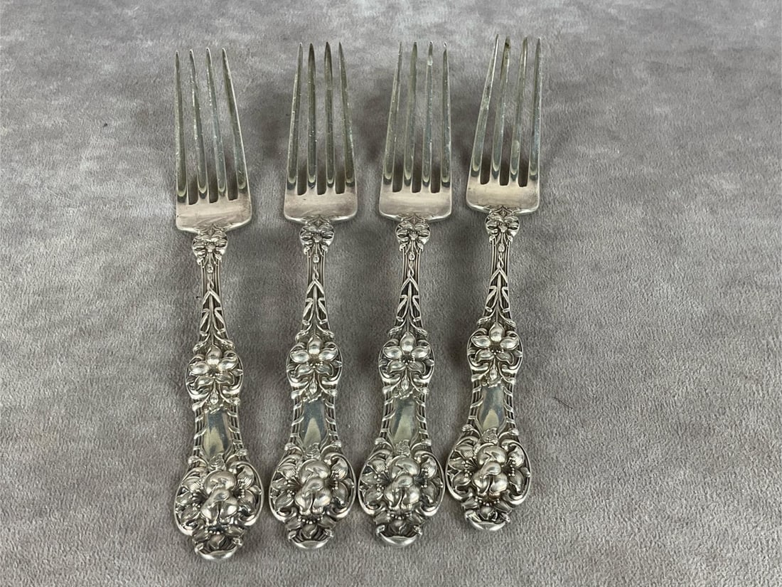 Alvin Sterling Silver Forks: Orange blossom design. Group of four dinner forks, tarnished and scratched. Weighs 5.91 ozt.