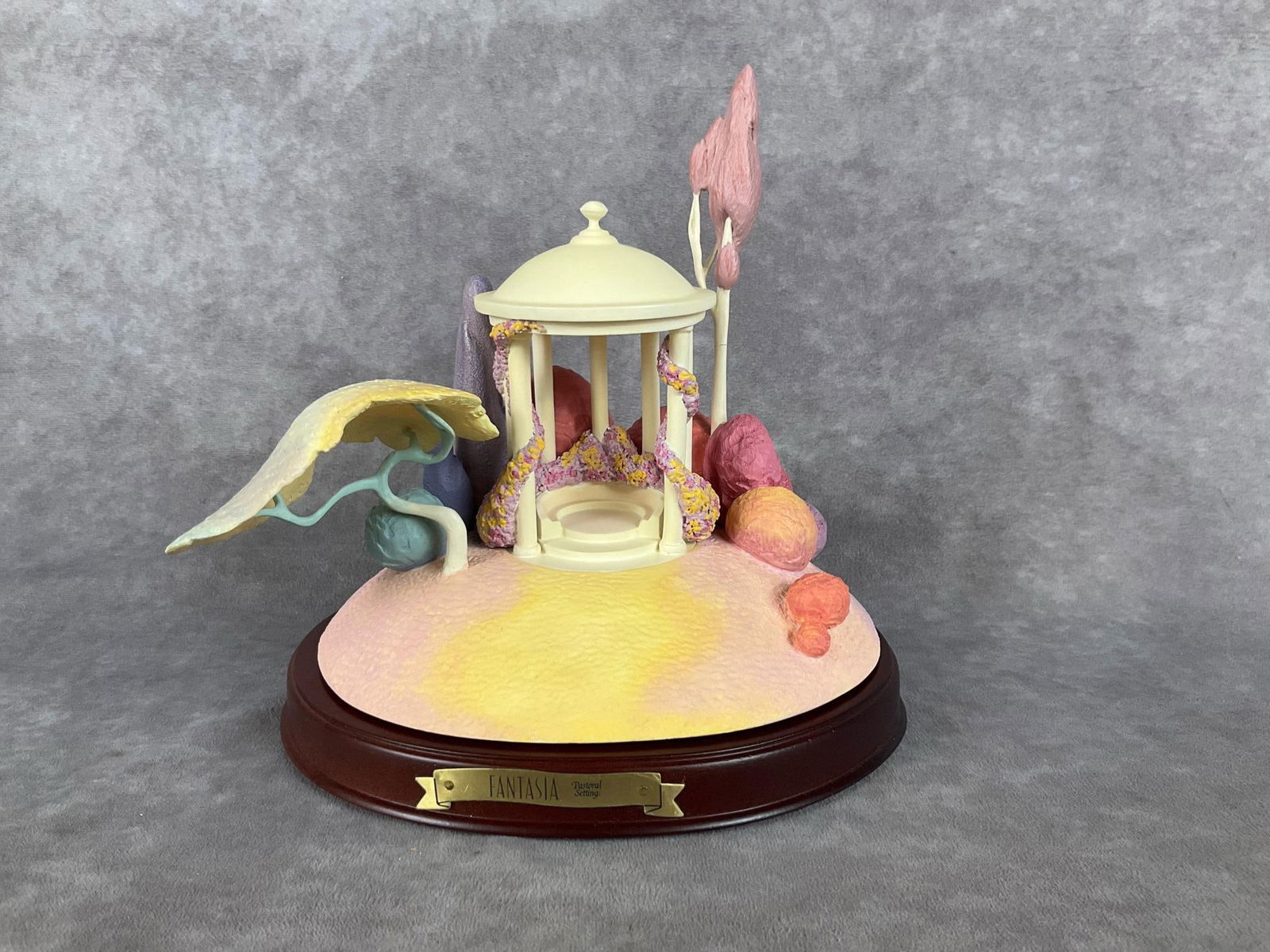 Disney Fantasia Pastoral Setting: 1997 Walt Disney Classics Collection Enchanted Places limited edition Pastorial Setting. Includes wooden display, box and COA, in good condition. The box measures 14 inches long x 13 inches wide x 11