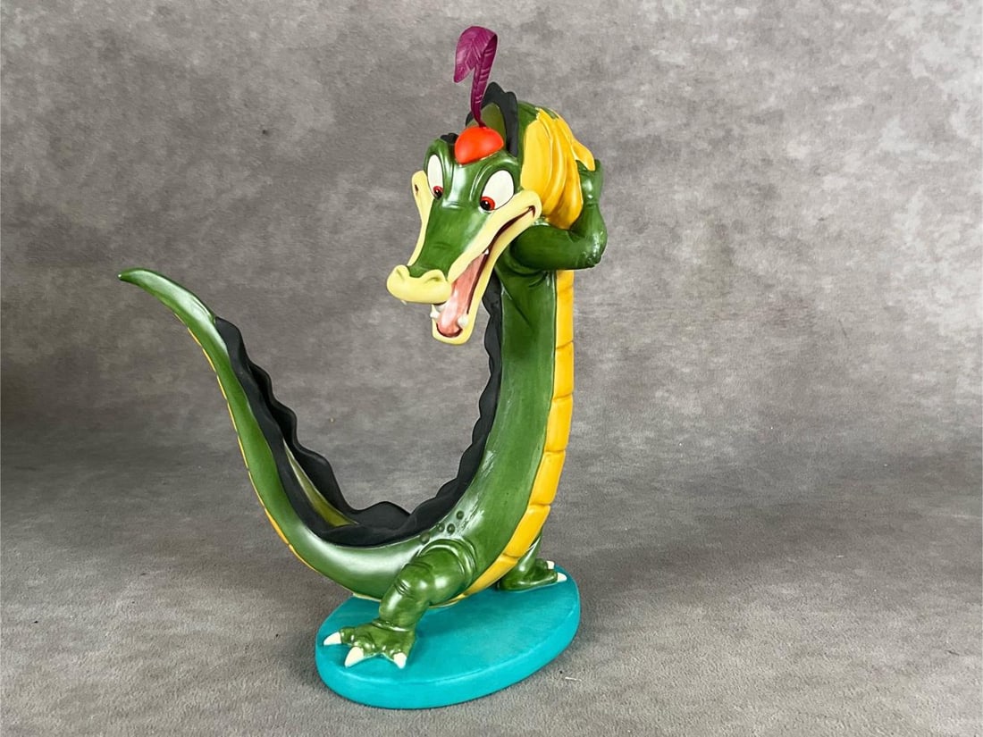 Disneys Fantasia Ben Ali Gator Figure: 1996 Walt Disney Classics Collection figure in good condition, complete with COA and box. The box has some creasing but is overall in good condition. The box measures 12 inches long x 8 inches wide x 