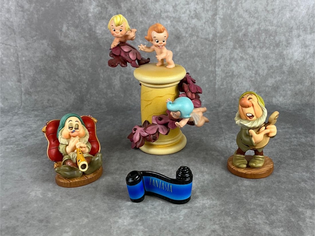 Disneys Fantasia & Snow White Figurines: Includes a 1995 Walt Disney Classics Collection Fantasia Loves Little Helpers, Opening Title, Snow White and the Seven Dwarfs Zzzzzzz and Ah-Choo figures. All but Loves Little Helpers have COA, all fi