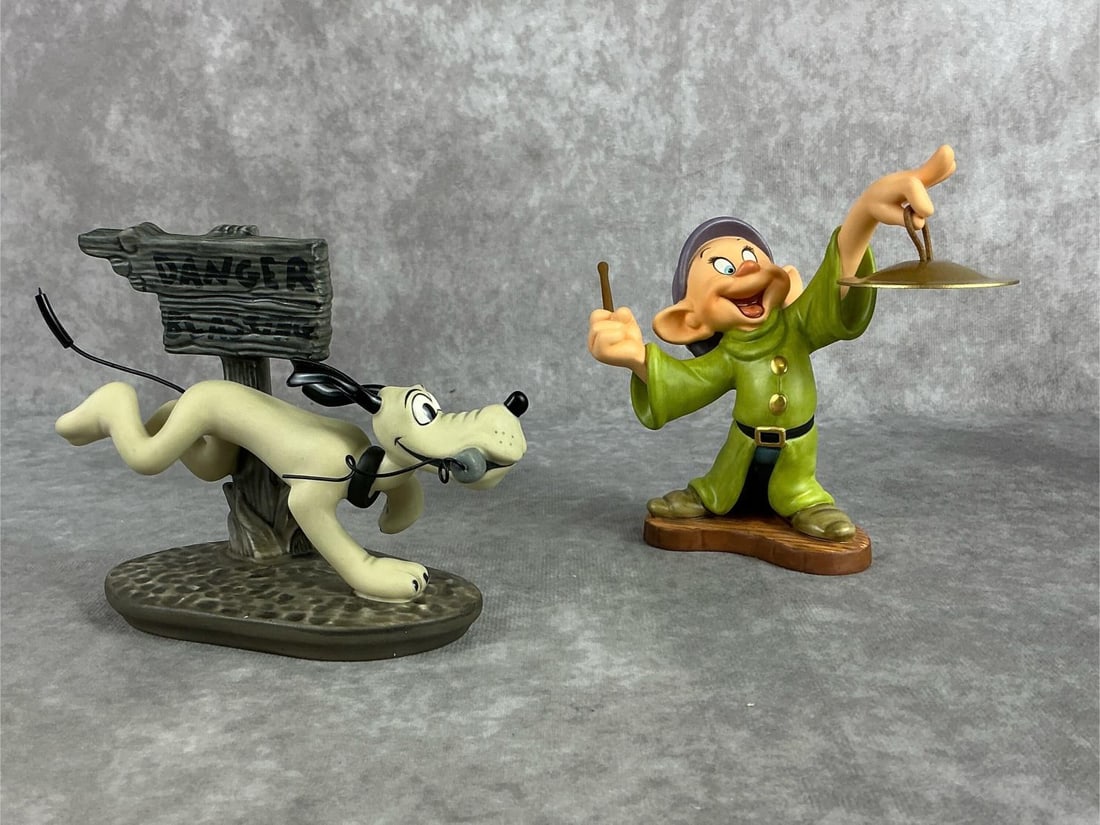 Walt Disney Classics Collection Figures: Includes a mid 1990s The Delivery Boy Dynamite Dog figure, and an early 2000s Snow White Dopy figure complete with paperwork. Both boxes have some creasing and denting but both figures are in good con