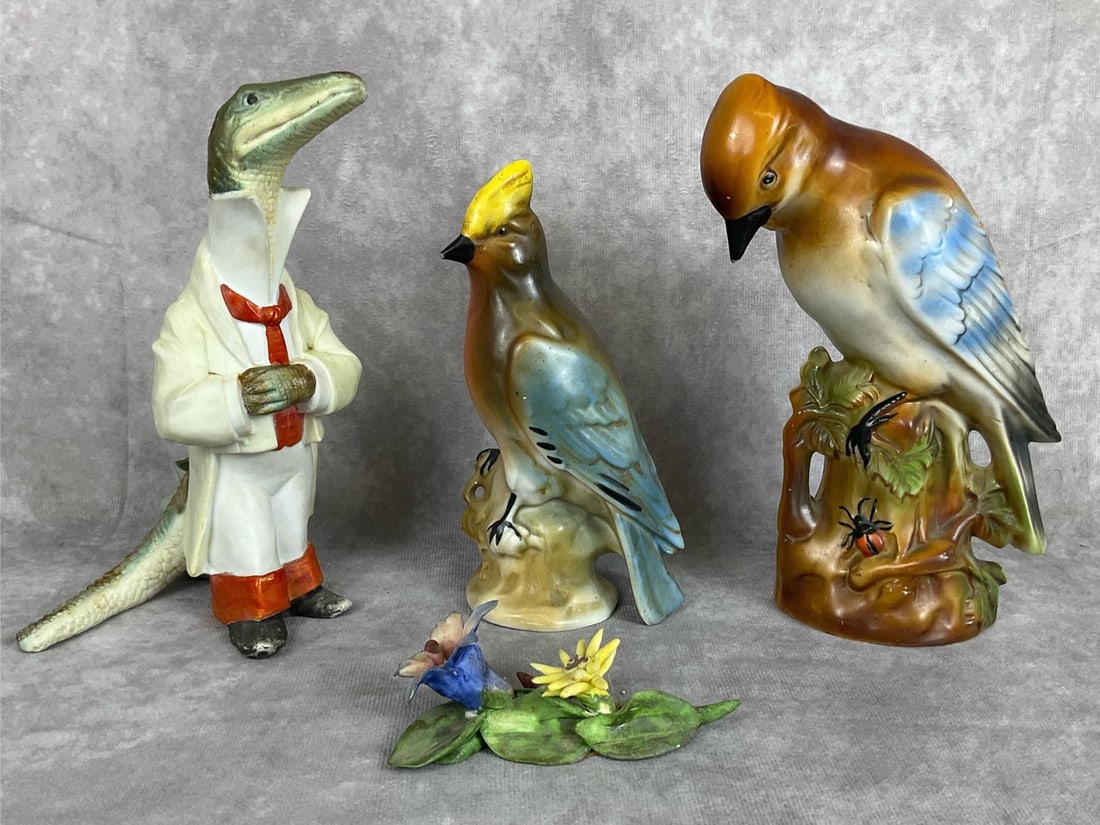 Alligator Match Holder & More: Early 20th century bisque china alligator match holder. Capodimonte Mollica flowers, two petals on blue flower are chipped. Two made in Germany birds, both have chipped beaks. Tallest measures 5.5 inc