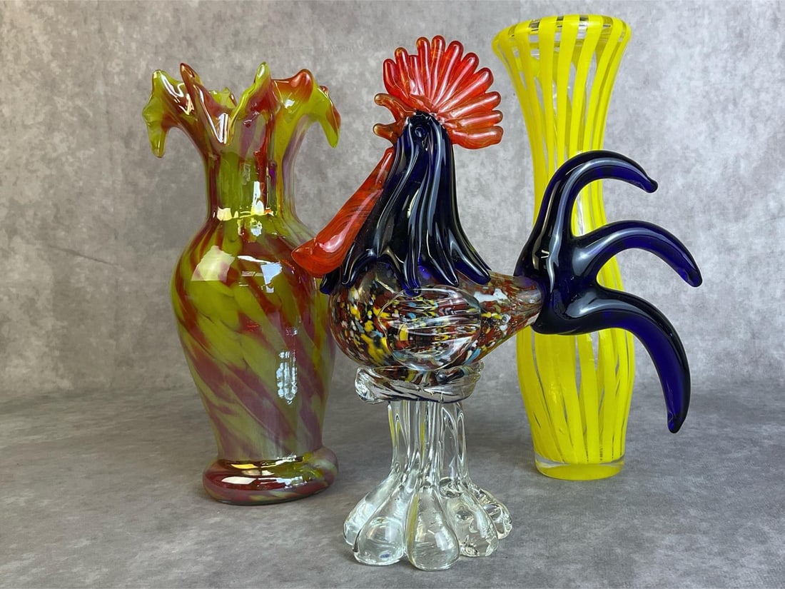 Murano Rooster & More: Murano large glass confetti rooster statue, crate and barrel yellow squeeze vase, and hand-blown polychromatic orange ruffled rim flower vase. All in good condition with tallest measuring 2 inches wid