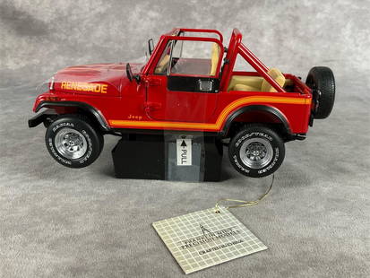 Franklin Mint Jeep Renegade: CJ-7, 1:24 scale. In original box, with gloves, COA, tags, and accessories. Jeep is in good condition. Box has creases and wear, and measures 11 inches wide x 5.5 x 6.5 inches tall.