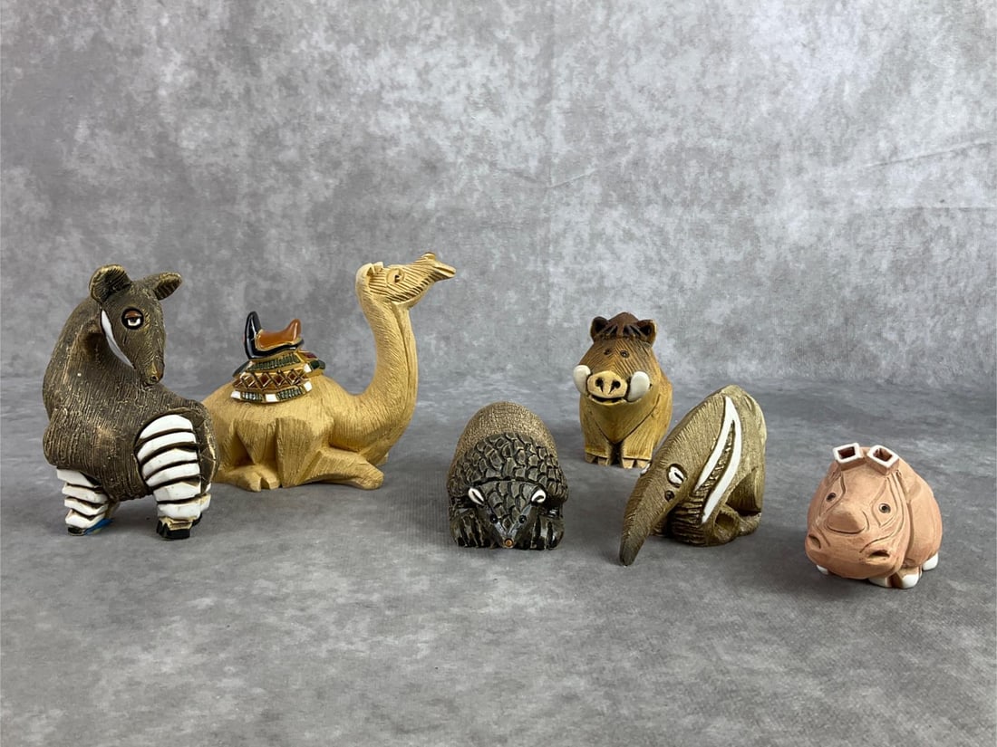 Artesania Rinconada Lot: Lot of six Artesania Rinconada safari figures including a camel, boar hog, armadillo, anteater, and more. All in good condition. Camel measures 3.5 inches wide x 4 inches tall.