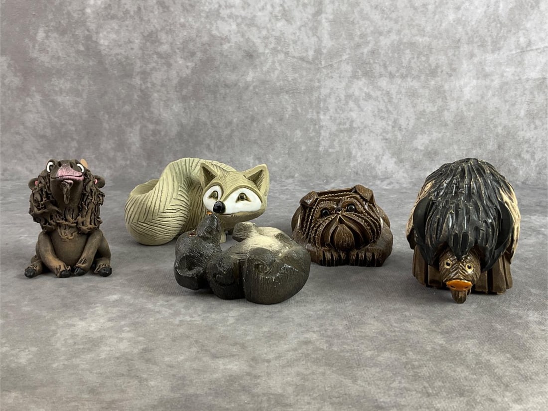 Artesania Rinconda Animal Lot: Artesania Rinconada ceramic wildlife sculptures including a fox, bulldog, goat, puppy, and a bison. In good condition and signed on the bottom. Fox measures 4.25 inches wide x 2.5 inches tall.