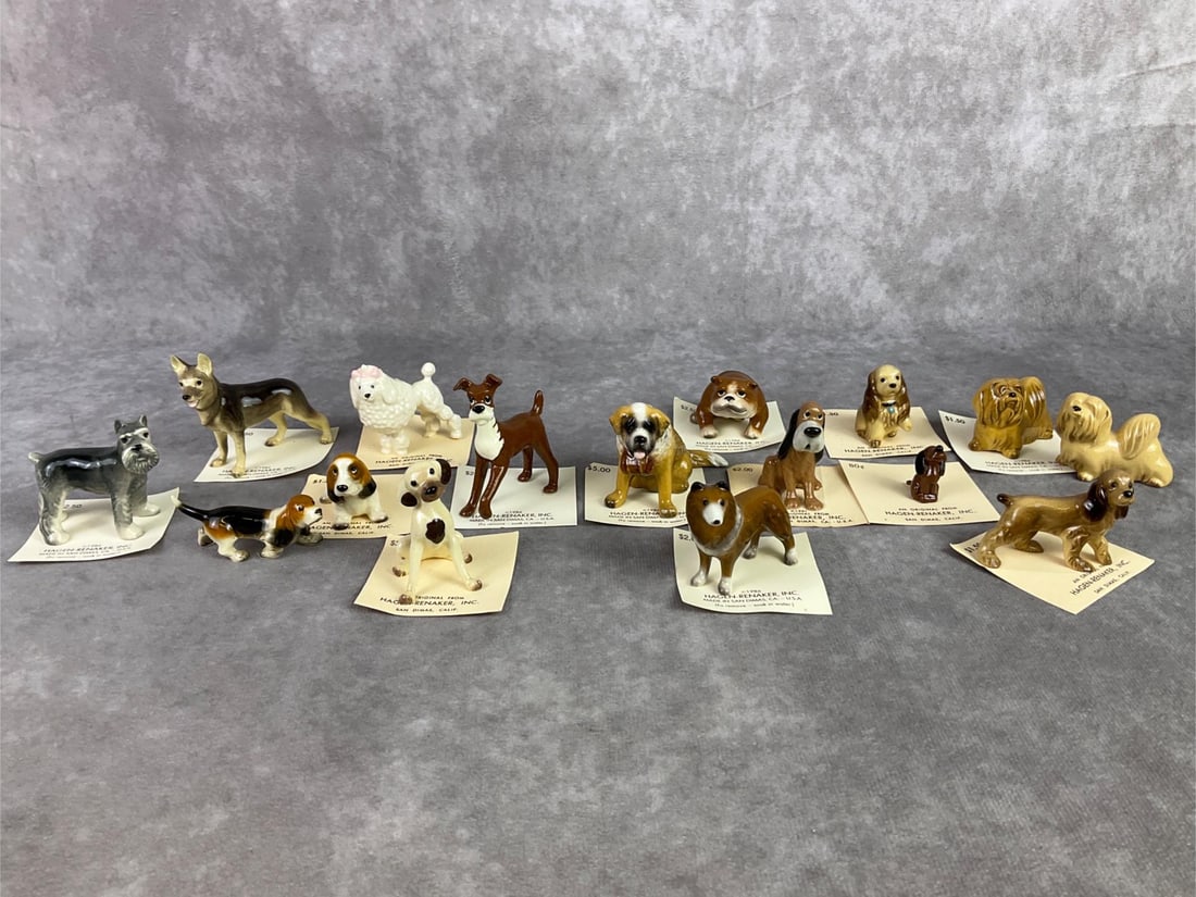 Hagen Renaker Dog Lot: Lot of sixteen Hagen Renaker miniature dogs, in a variety of breeds. All in good condition. German shepherd measures 2 inches wide x 2.25 inches tall.