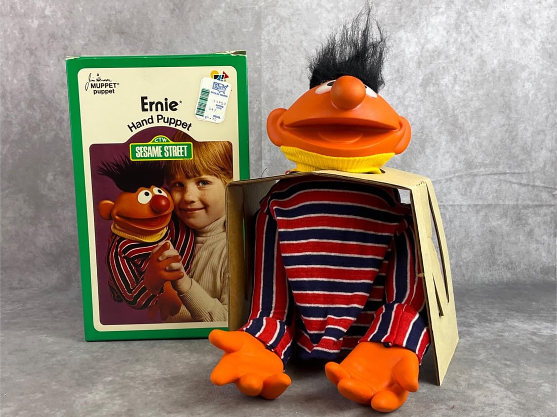 Ernie Hand Puppet: 1973 Ernie hand puppet from the Jim Henson Muppets Puppets. In original box and in good condition. Box measures 6.75 inches wide x 5.25 inches x 11 inches tall.