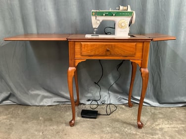 Singer Sewing Machine in Cabinet