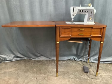 Singer Sewing Machine In Cabinet