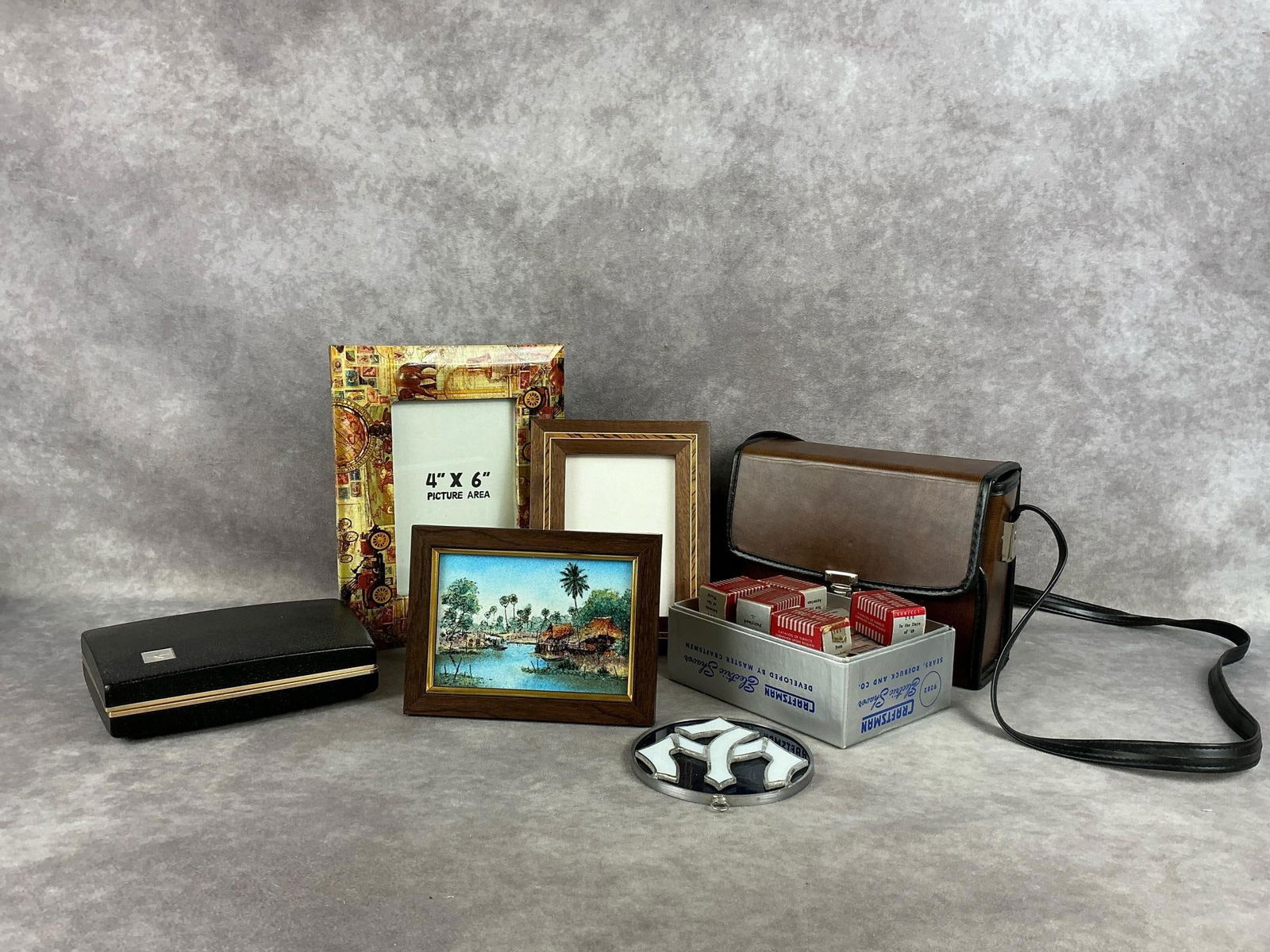 Film Inspired Accents: Group of picture frames, binoculars, 3D film, and more. All in good condition. Largest picture frame measures 4 inches wide x 6 inches tall.