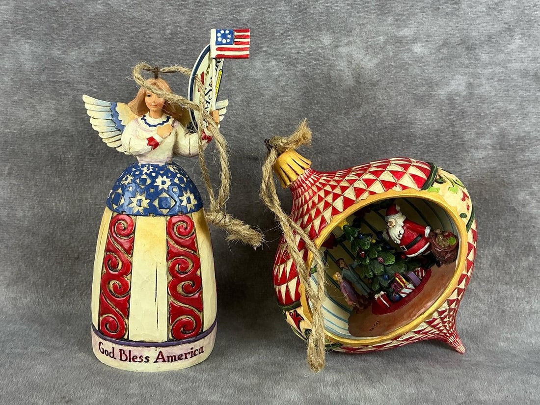 Jim Shore Christmas Ornaments: Jim Shore Christmas theme diorama ornament and Heartwood Creek angel. Both in good condition. Angel measures 2 inches wide x 5 inches tall.